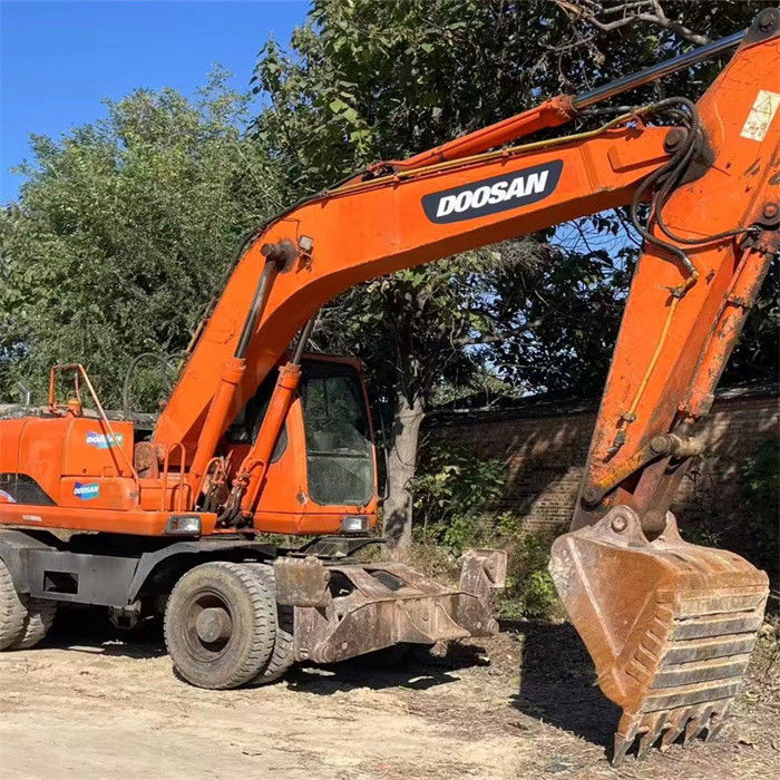 कम कीमत 22 टन इस्तेमाल किया कोरियाई पहिया खुदाई Doosan DX 210W-7 कम काम के घंटे के साथ