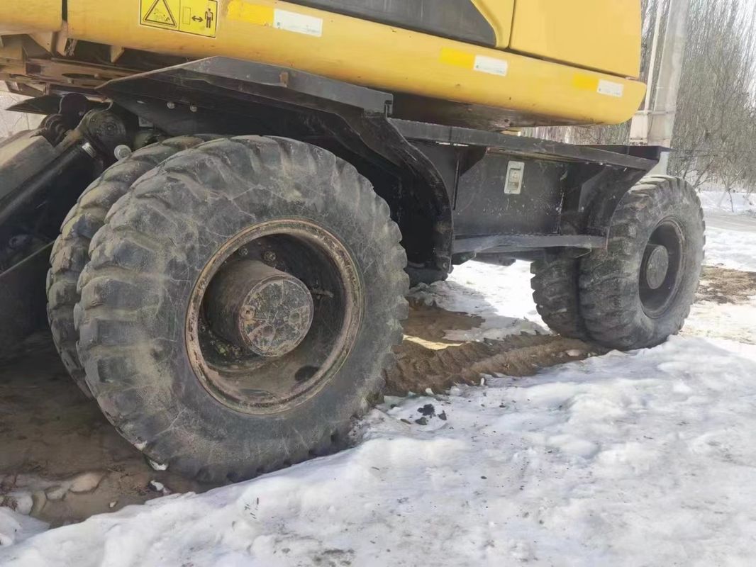 काम करने के लिए तैयार कैटरपिलर M315D कम कार्य घंटों के साथ और अच्छी स्थिति में इस्तेमाल किया पहिया खुदाई मशीन