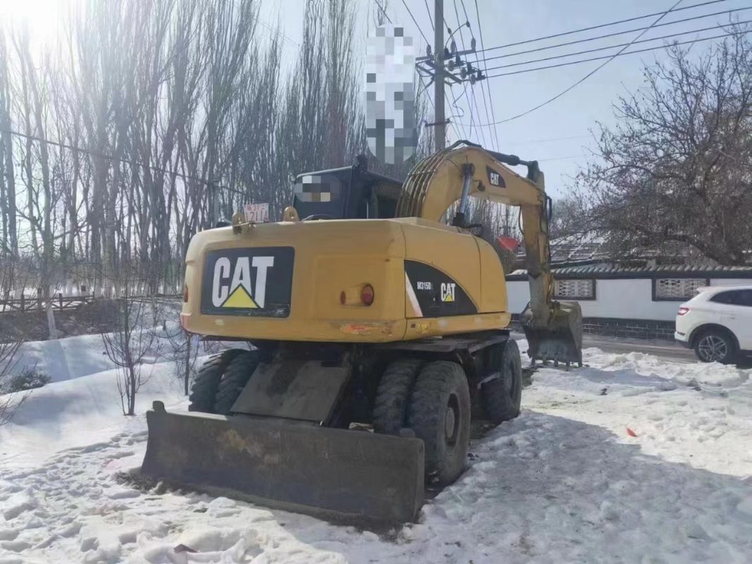 काम करने के लिए तैयार कैटरपिलर M315D कम कार्य घंटों के साथ और अच्छी स्थिति में इस्तेमाल किया पहिया खुदाई मशीन