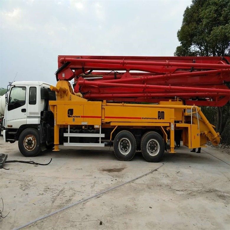 पीला प्रयुक्त चेसिस पुट्ज़माइस्टर कंक्रीट पंप ट्रक 37 मीटर 12M3/H उत्पादकता के साथ