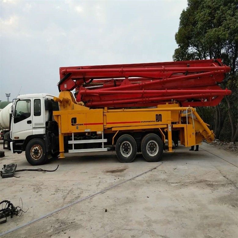 पीला प्रयुक्त चेसिस पुट्ज़माइस्टर कंक्रीट पंप ट्रक 37 मीटर 12M3/H उत्पादकता के साथ