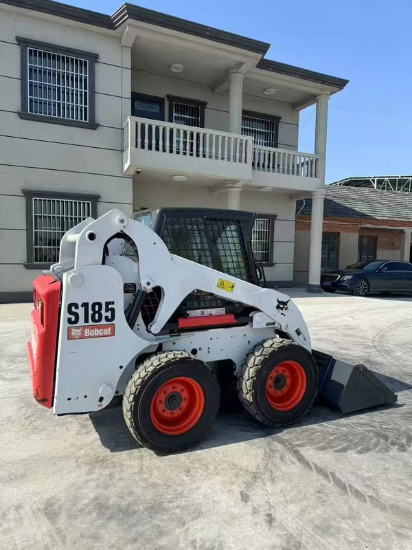 चीन निर्यातक से प्रयुक्त Bobcat S185 स्किड स्टीयर लोडर उच्च गुणवत्ता वाली सेकंड-हैंड मशीन