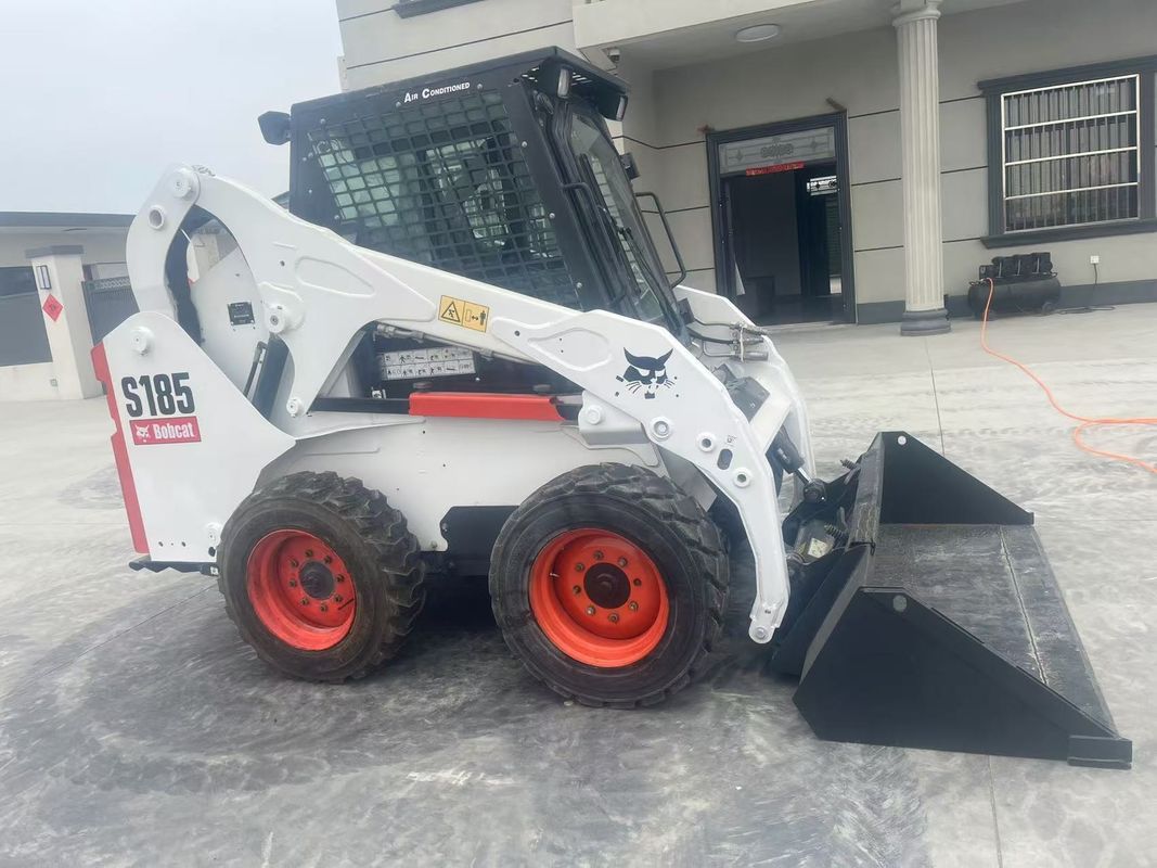 चीन निर्यातक से प्रयुक्त Bobcat S185 स्किड स्टीयर लोडर उच्च गुणवत्ता वाली सेकंड-हैंड मशीन